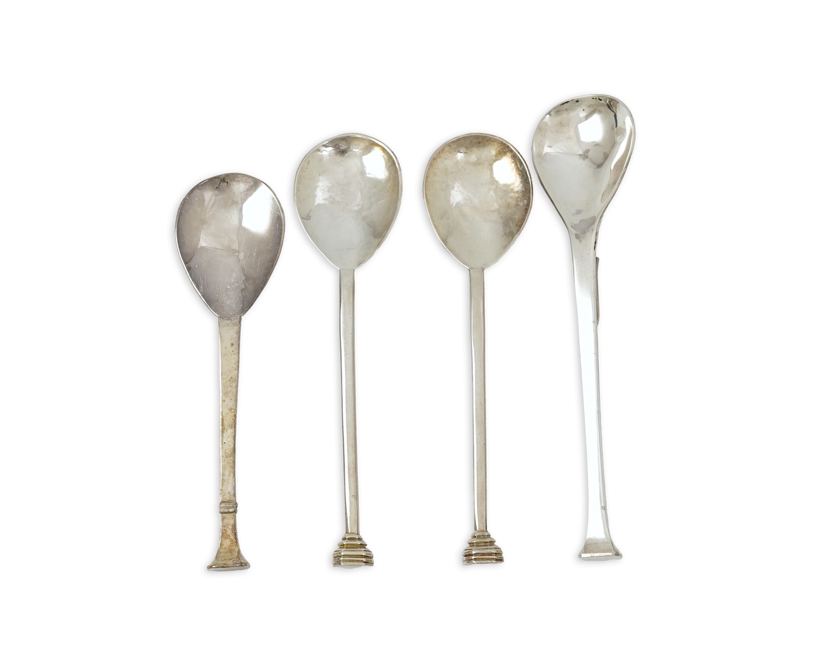 A pair of Elizabeth II silver 'seal top' spoons by The Guild of Handicrafts, London, 1990, 16cm, together with a similar later spoon, London, 2008 and a similar preserve spoon, London, 2003, two with boxes.